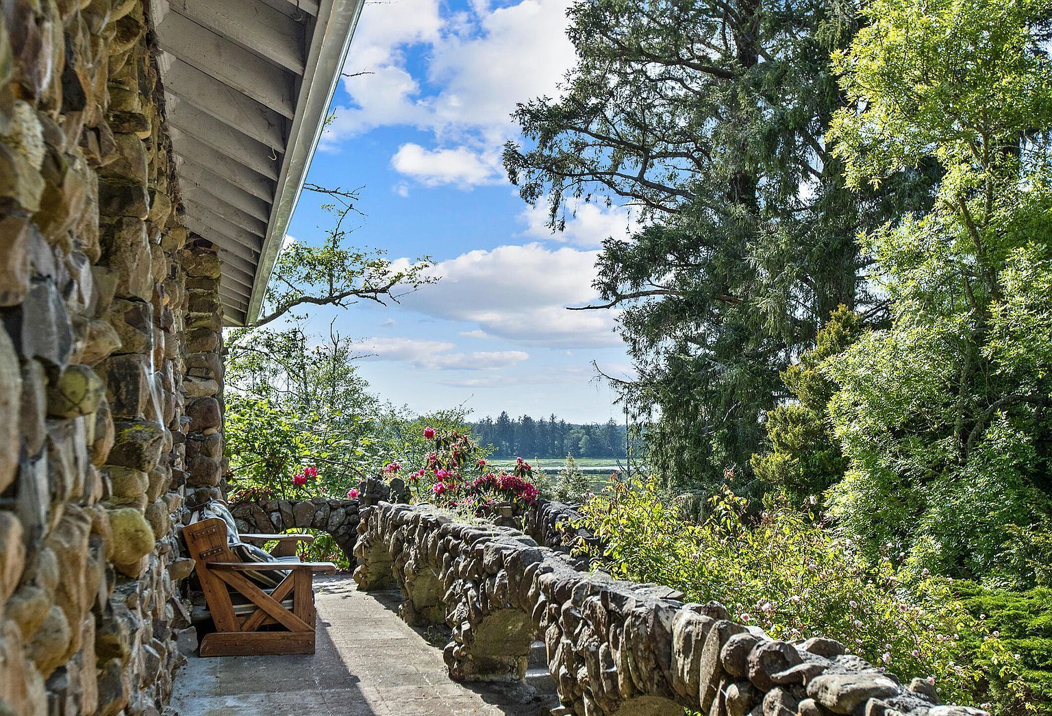 Covered stone porch looking out over the Lewis & Clark Valley